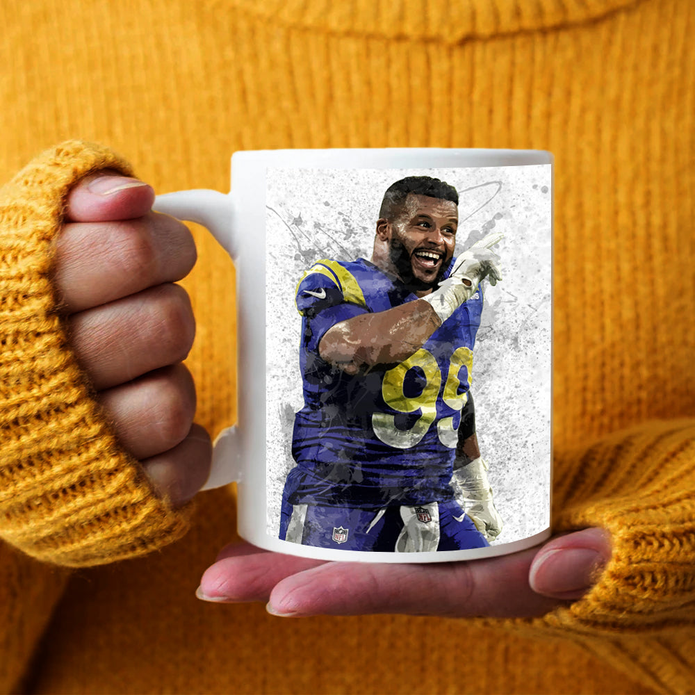 Taza y posavasos con efecto salpicado de Aaron Donald