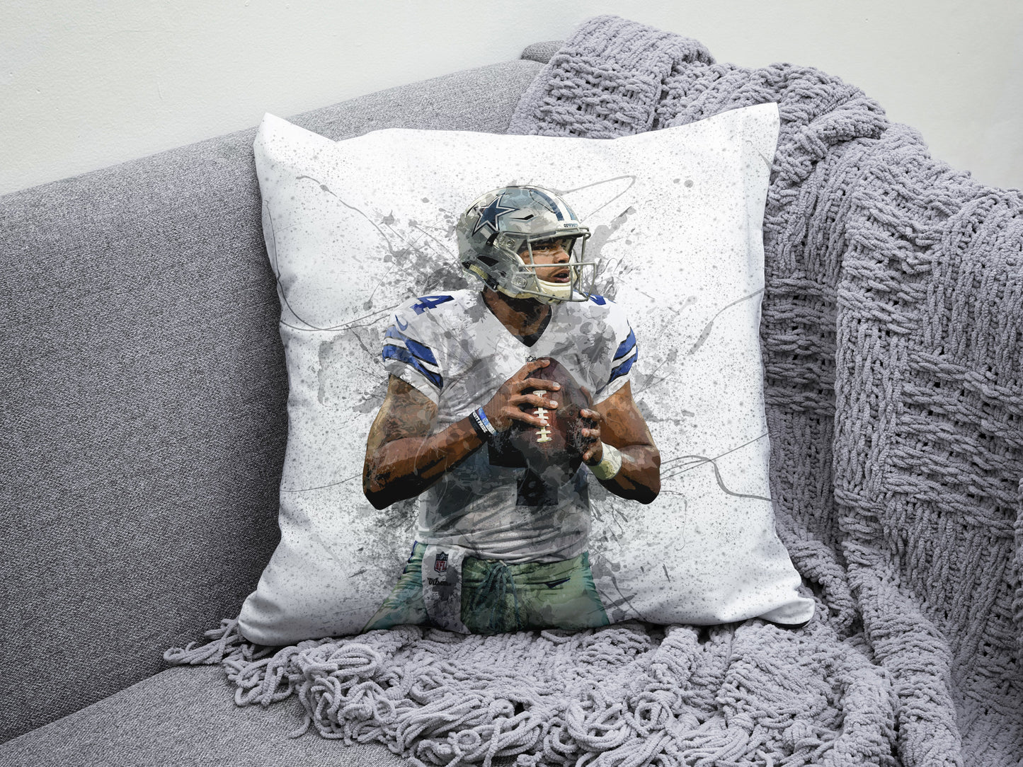 Almohada con efecto salpicadura de Dak Prescott