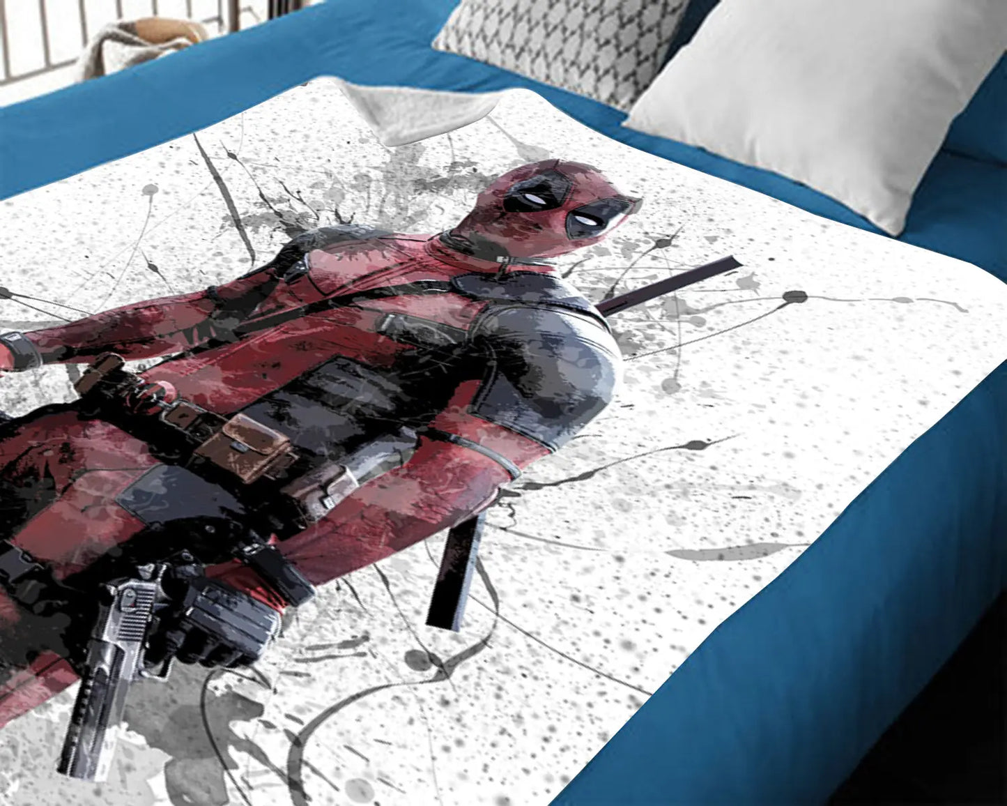 Manta polar con efecto salpicadura de Deadpool