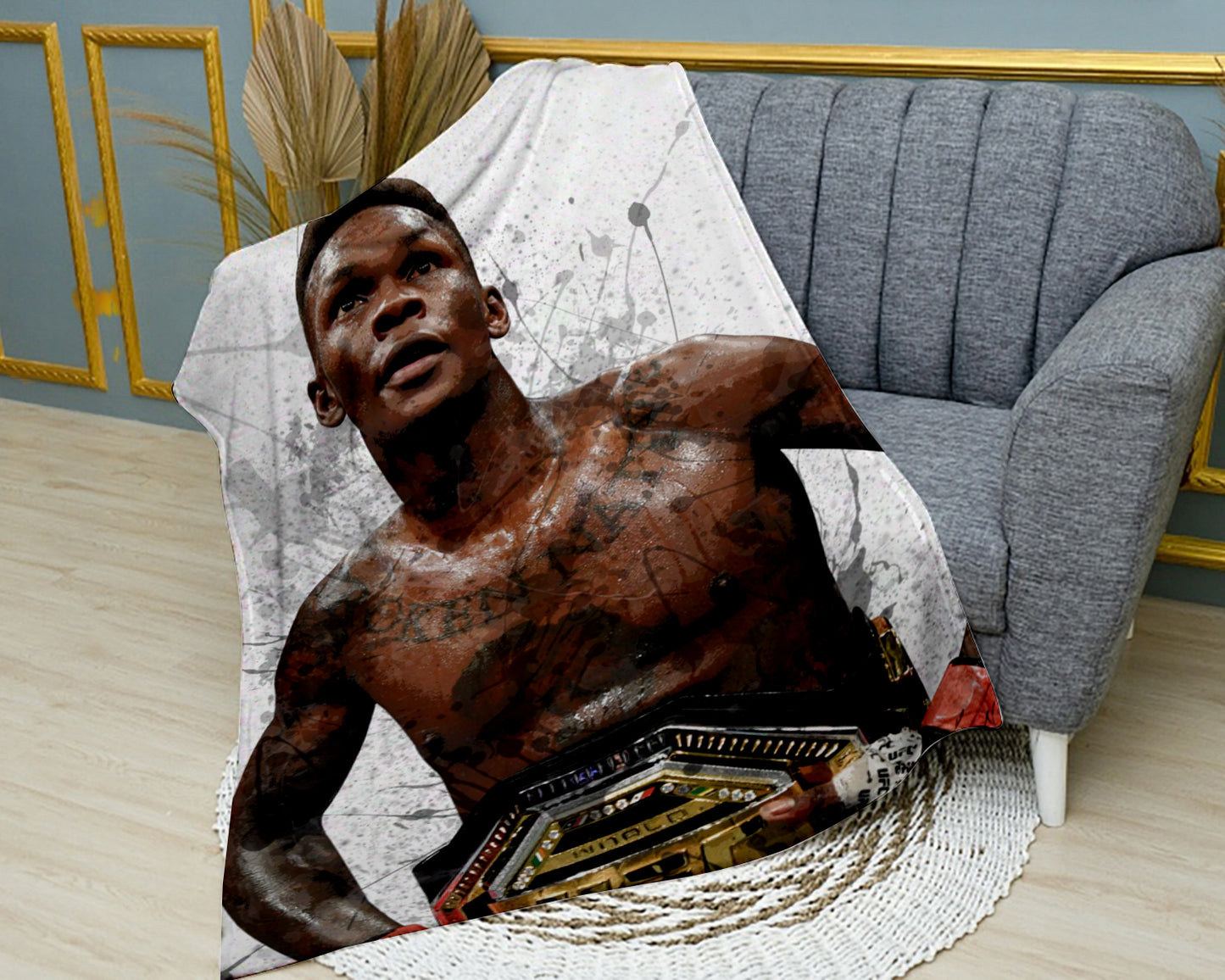 Manta polar con efecto salpicado de Israel Adesanya