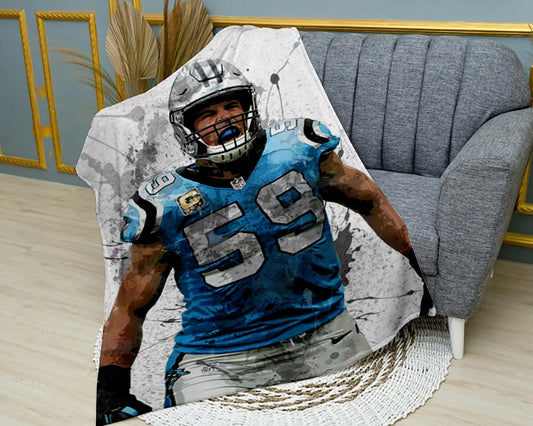 Manta polar con efecto salpicado de Luke Kuechly