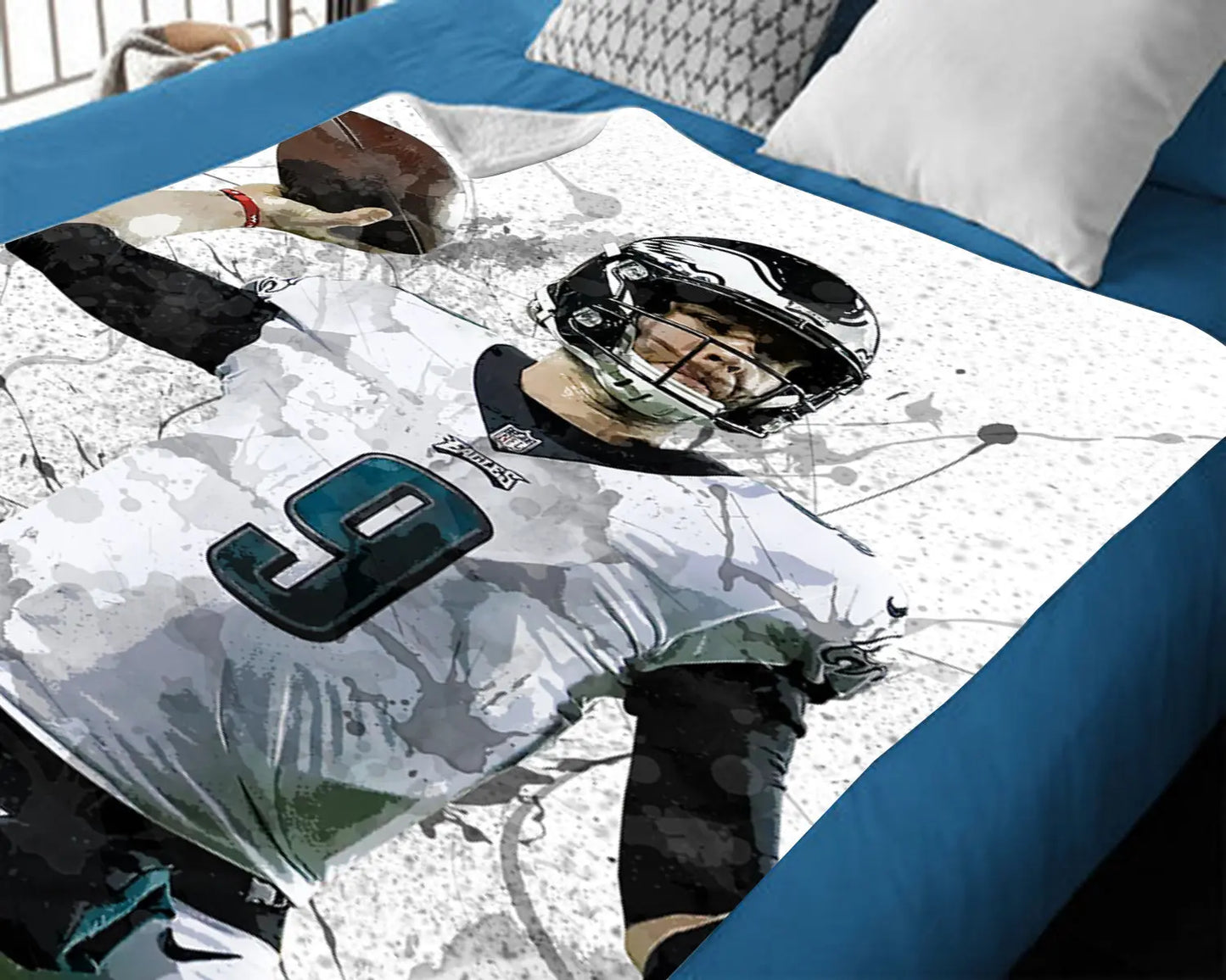 Manta polar con efecto salpicado de Marcus Mariota