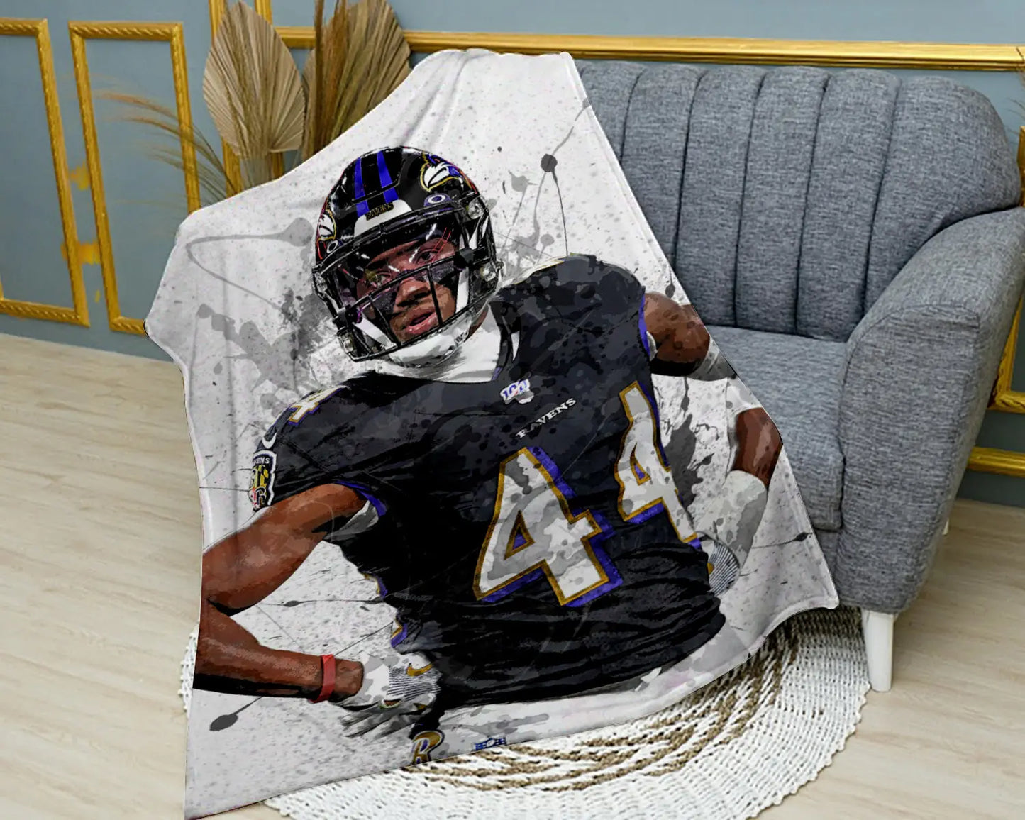 Manta polar con efecto salpicado de Marlon Humphrey