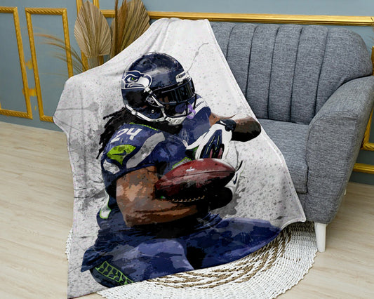 Manta polar con efecto salpicado de Marshawn Lynch